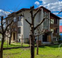 A family house on 17. novembra Street in Stará Ľubovňa with a large garden and trees.