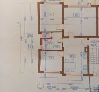 Floor plan of a 3-room apartment with rooms, kitchen, and bathroom.