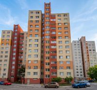 Apartment building on Mlynarovičova Street in Bratislava - Petržalka with parking in the vicinity.