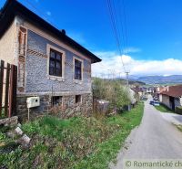 Unique properties in Heľpa: older house with stones and a view of the countryside.