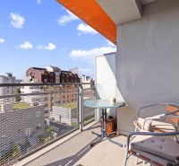 Balcony of a 2-room apartment with a view of the rooftops on Majerníkova Street in Bratislava.
