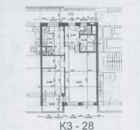 Floor plan of a 2-room apartment showing rooms and sanitary facilities.