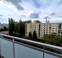 The view from the balcony on Čmelíková Street in Bratislava - Ružinov, surrounded by greenery.