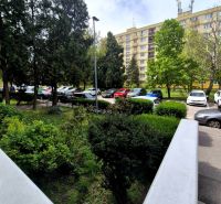 A view of the parking lot and residential block on Čmelíkova in Bratislava - Ružinov.