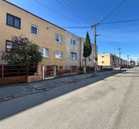 A family house on Hurbanova Street in Trenčín with a parking lot and electrical wiring.