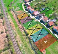 Aerial view of divided residential plots in Hodejov near the railway.