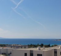 Recreational apartment in Novalja with a view of the sea and greenery.