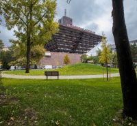 The building of Slovak Radio on Tabakova Street in Bratislava, surrounded by greenery.