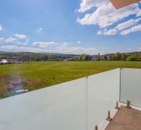 A balcony in a 2-room apartment with a view of nature and fields on Moravanska Street in Banka.
