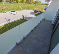 Balcony at a 2-room apartment with a view of the parking lot and greenery on Moravanska Street, Banka.