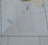 Plan of a plot with a built-up area and parking spaces on the property in Malá Mača.