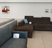 The commercial spaces display sofas and art paintings on the wall.