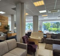 Commercial spaces offer comfortable seating with a view of Račianska 99, Bratislava.