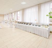 Spacious commercial spaces with large windows and wooden decor flooring.