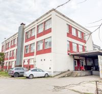 A building with commercial premises on Jána Zigmundíka Street in the town of Vrbové.