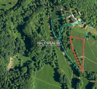 Aerial view of recreational land surrounded by forests in Horné Hámre.