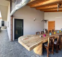 Family house in Pama with a terrace, a massive table, and outdoor seating.