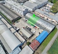 Aerial view of warehouses and halls on Coburgova Street in Trnava with a parking lot.