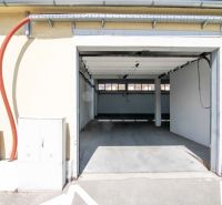 Open entrance to the garage in warehouses and halls on Coburgova Street, Trnava.