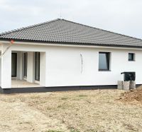 A family house on Hlavná Street in Michalovce with a sloped roof and a terrace.