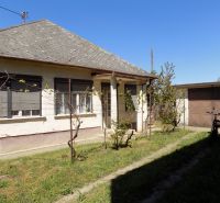 A family house in Strekov on Strekov Street with a yard and a garage.