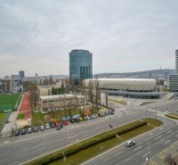 View from Bajkalská Street in Bratislava, where you can see the stadium, roads, and buildings.