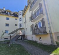 Apartment building on Cukrovarska Street in Trenčianska Teplá, with a well-maintained lawn.