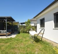 A family house in Rajka with a terrace, lawn, and a hammock in the garden.