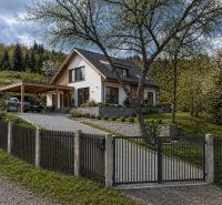 A house with a garden and a gazebo in Krásno nad Kysucou intended for residential plots.