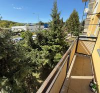 Balcony of a 3-room apartment on Tulská Street in the city of Zvolen with a view of greenery.