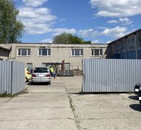 Cars and an industrial building on Košická Road, Rimavská Sobota, Special properties.