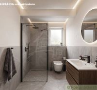A bathroom in a family house with a large shower and a round mirror.