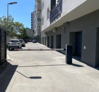 Parking lot in front of the garages on Kazanská Street in Bratislava-Podunajské Biskupice.