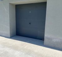 Closed garage door on Kazanská Street in Bratislava - Podunajské Biskupice.