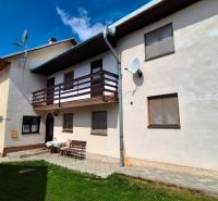 A family house in Jarabina on Jarabina Street with a balcony and a landscaped garden.