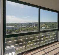 Glazed balcony with a view of greenery in Bratislava - Old Town on Martinengova.