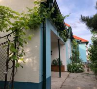 A family house on Majcichov Street in Majcichov, surrounded by greenery and paving.