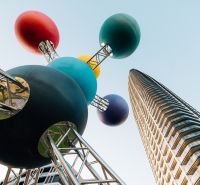 Colorful sculpture and modern high-rise building, Residential construction.