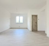 Interior of a family house with a window and a wooden decor floor.