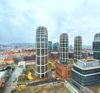 Panorama of Bratislava with four rounded towers and the surroundings of Landererova Street.