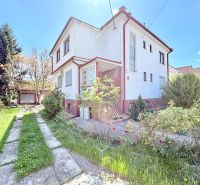 A family house on Puškinova Street in Partizánske with a garden and a driveway.