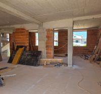 Construction of a 3-room apartment with concrete ceilings and brick walls.
