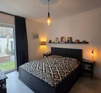 Bedroom with a bed and decorations, access to the garden, Family house.