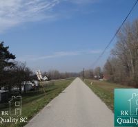 The path runs along the forest and houses at the Old Port Gabčíkovo, plots - housing.