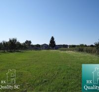 Plots - housing on Jelka - Vrbová Street, Galanta, with grassy area and trees.