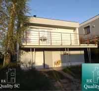 Cottage at SUNNY LAKES SOUTH in Senec with a garden and terrace.
