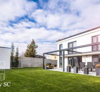 A family house at Slnečné jazerá juh in Senec with a spacious garden and terrace.