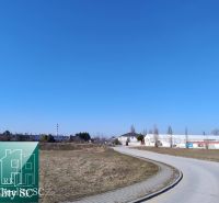 Plots - residential area at Sunny Lakes North in Senec, grassy terrain by the road.