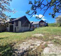 A family house in the village of Heľpa with a large, sunny garden and a rural setting.