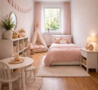 Children's room with pink accessories, a table, and a tent, floor with wooden decor.